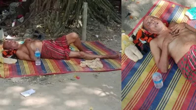 সমু চৌধুরী রাস্তায় শুয়ে আছেন